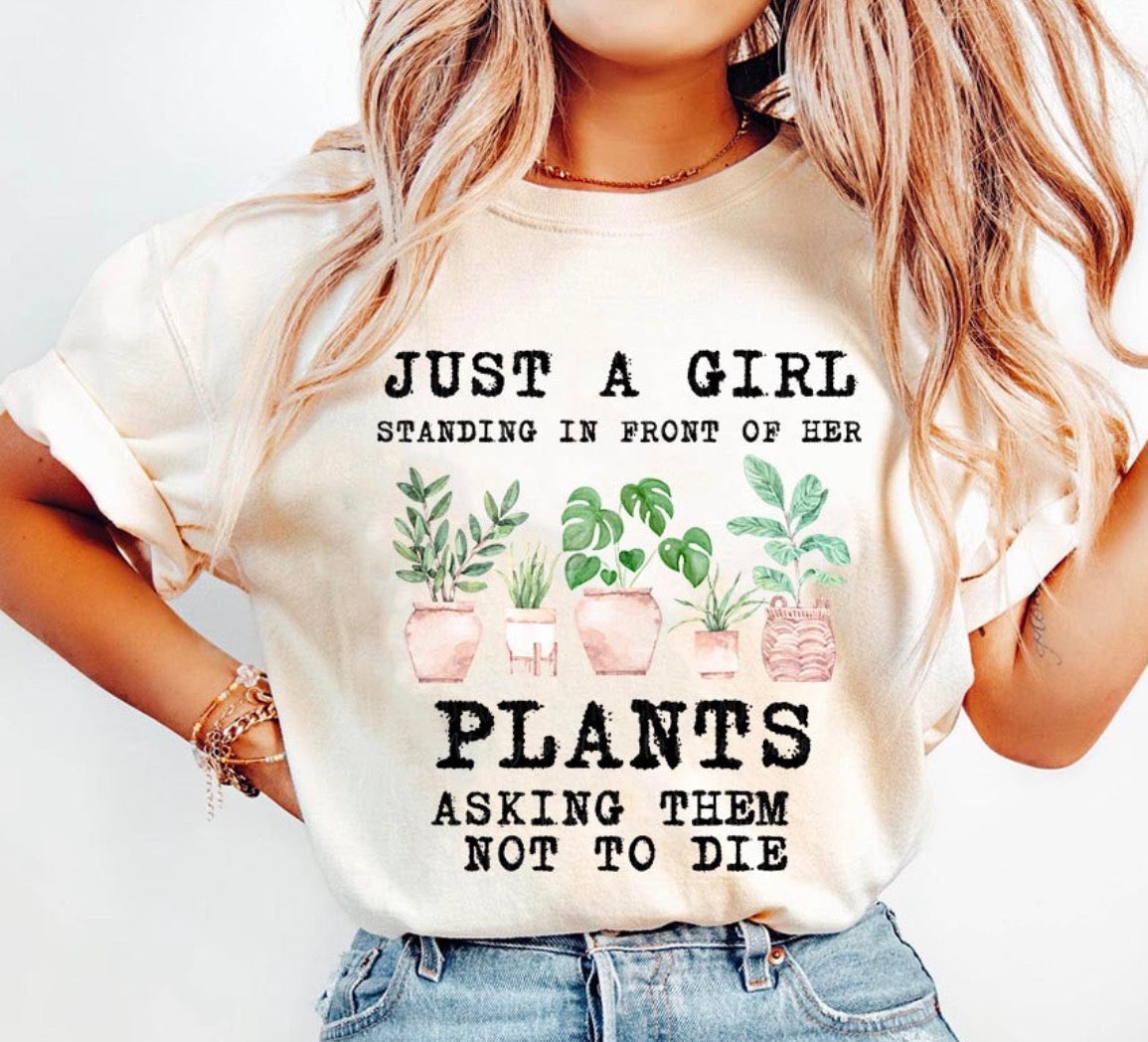 Just a Girl Standing In Front of Her Plants